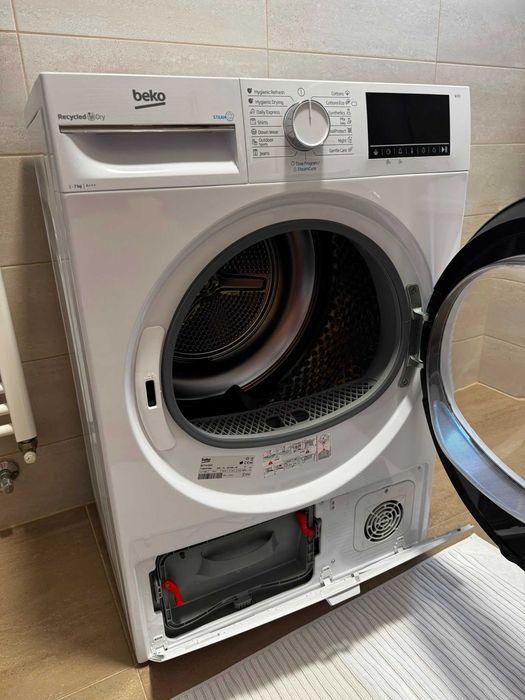 Uscator de rufe Beko  B3T41242 cu pompa de caldura