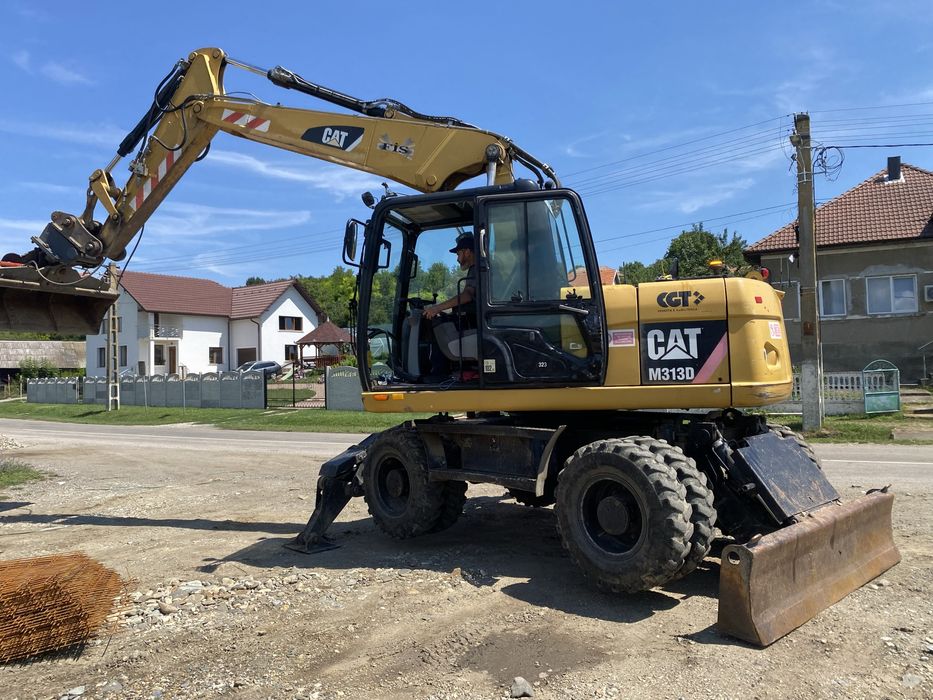 Excavator pneuri Cat 313 D