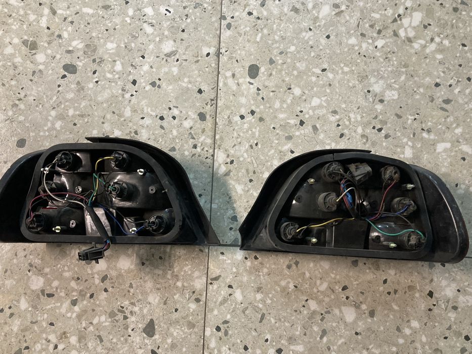 Задние фонари е38