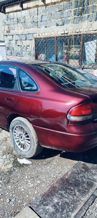 Машина Мазда кронус