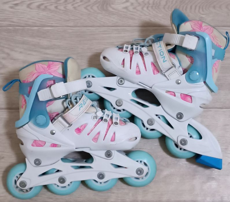 Роликовые коньки