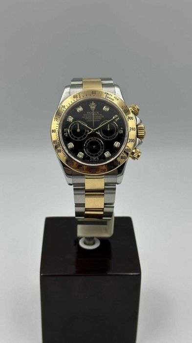 Rolex Daytona 116523, an 2006, 15500 euro