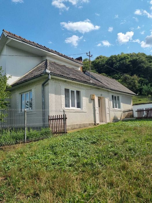 Vand casa plus teren de 25 ari