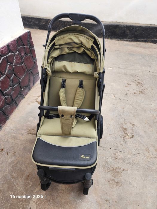 Teknum.  Детская прогулочная коляска.