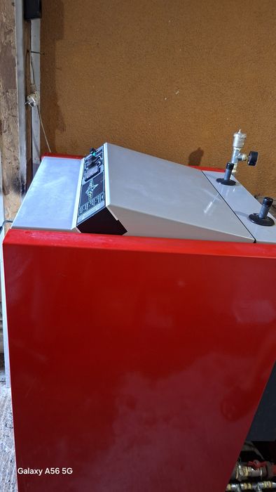 Пиролизен котел на дърва ATMOS DC 32 S (35 kW)