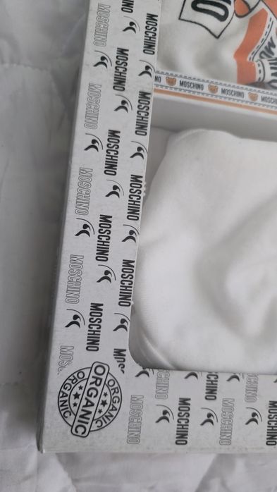 Set articole Moschino pentru nou nascuti