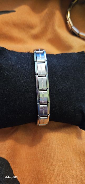 Гривна Nomination.