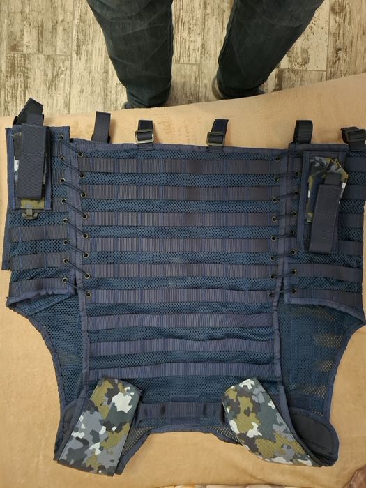 Vestă multifuncțională