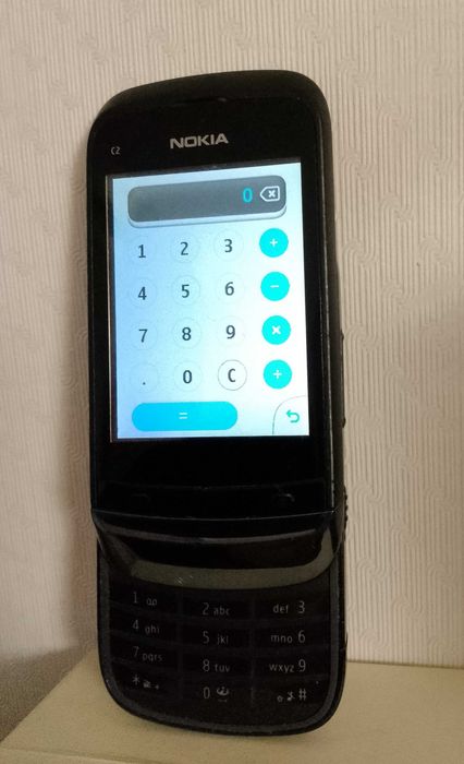 Nokia C2-02  (+кабел за зареждане)