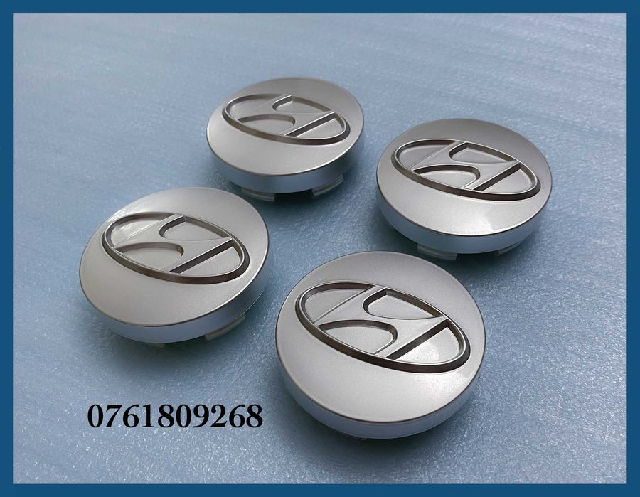 Set 4 capace argintii 57mm jante aliaj Hyundai