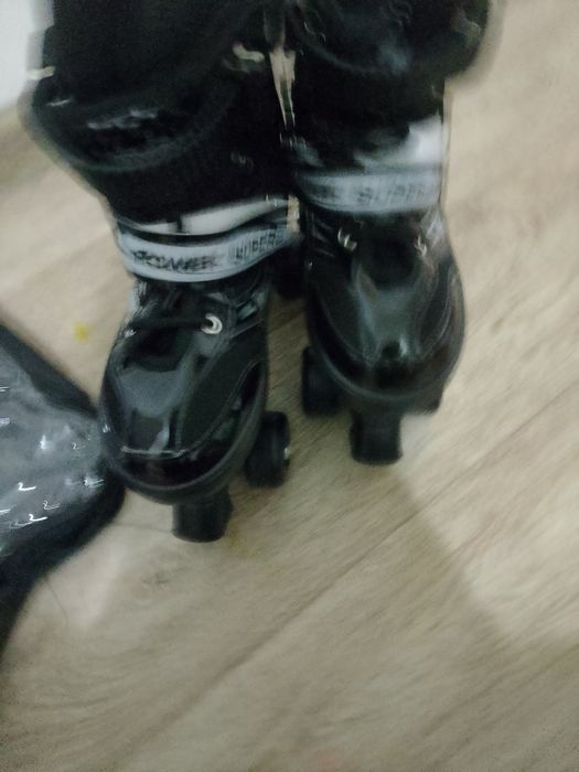 Роликовые коньки