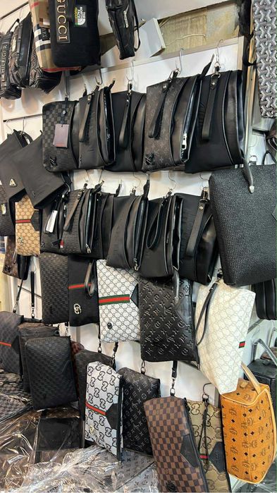 Дамски и мъжки чанти клъчове