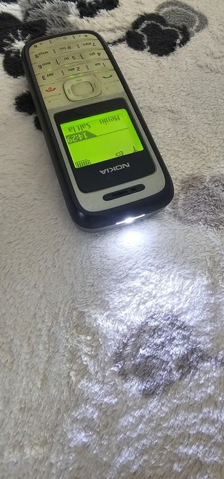 Nokia 1200 cu lanterna impecabil,accepta orice cartela, meniul este in limba română
