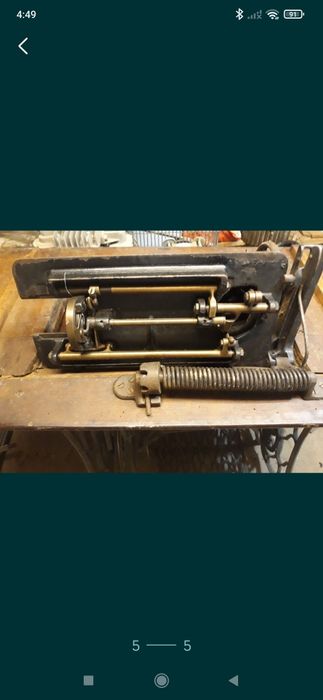 Mașina de cusut Singer