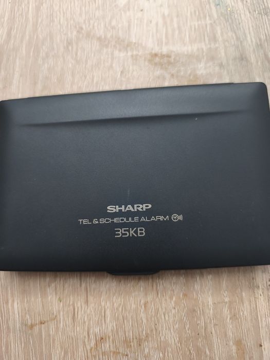 Agenda telefonică,calculator sharp
