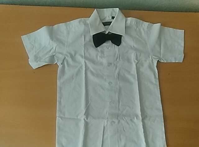 Продам школьную рубашку  для мальчика размер 9