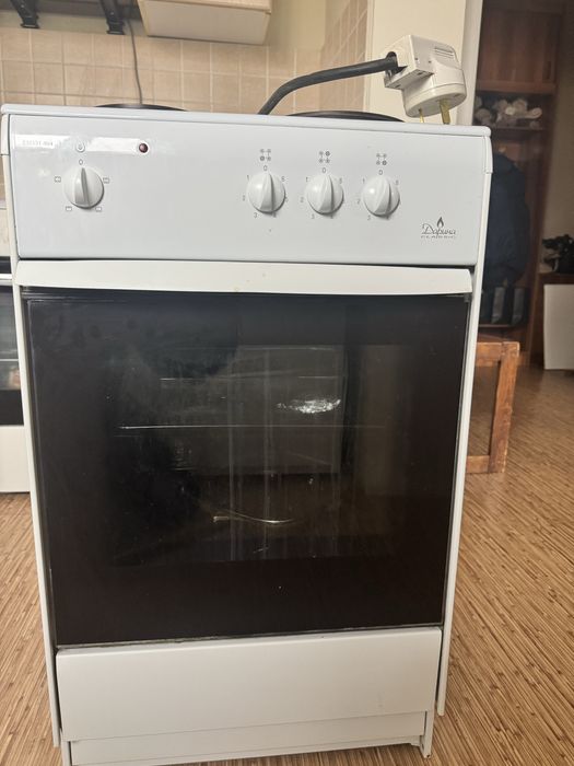 Электроплита с духовкой