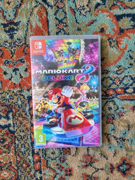 Vînd Nintendo Switch + joc Mario Kart