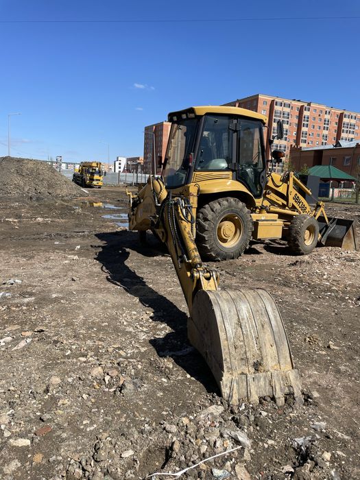 Эксковатор - погрузчик 3/1