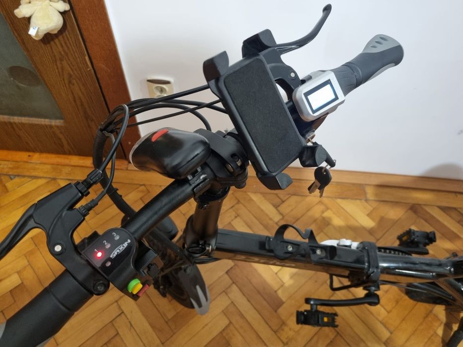 Bicicletă electrica pliabila