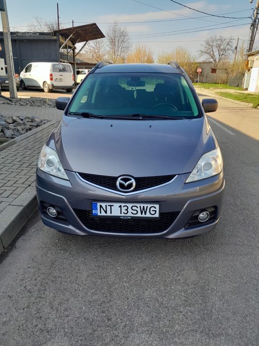 Vând  mazda 5  benzină