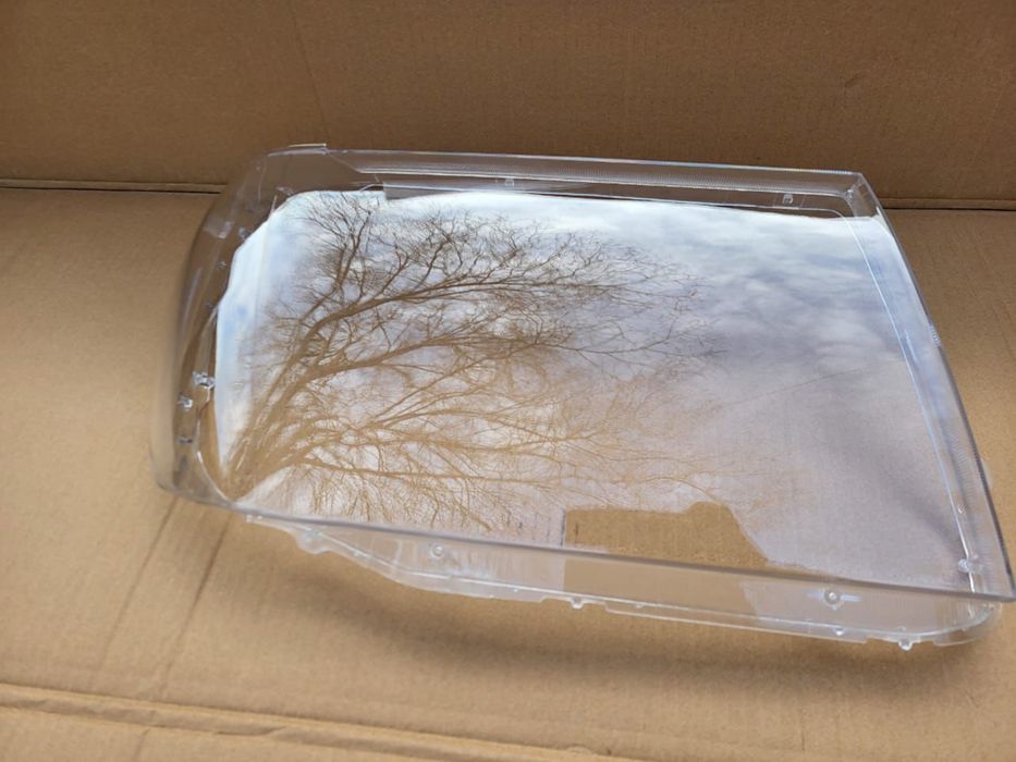 Стекло фары Land Cruiser 100