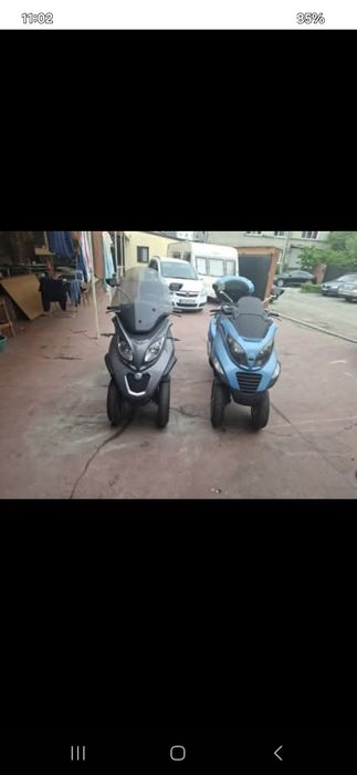 Vand Piagio D300 cel.negru și D250 Cel albastru