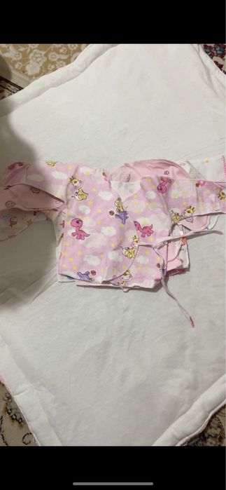 Одежды для новорожденных