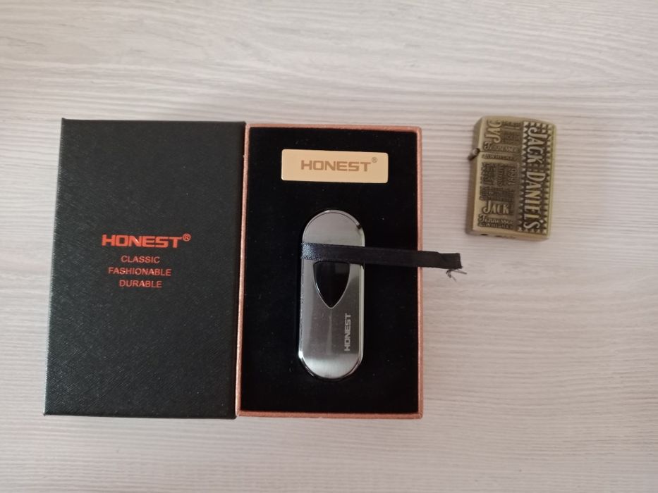 Продам оригинальную зажигалку Honest с электронной зарядкой