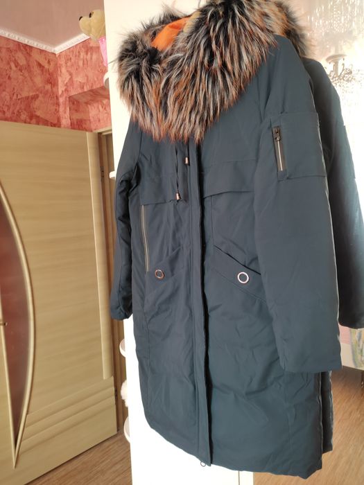 Продам пуховик 46 размер
