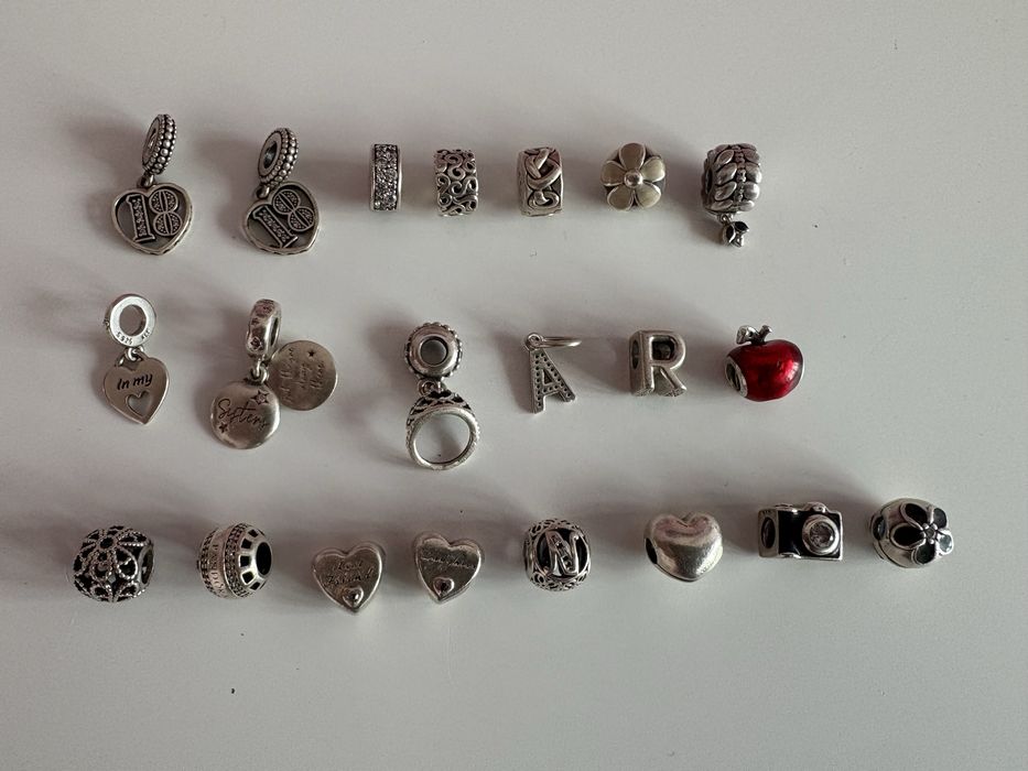 Гривни и талисмани Pandora