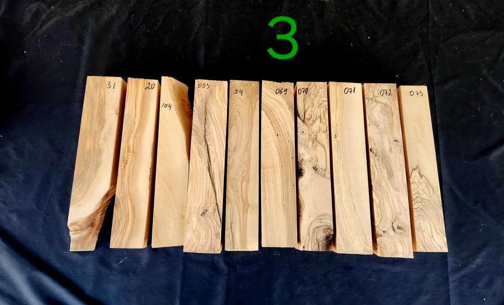 Заготовки (трупчета) от маслиново дърво (дървен материал)