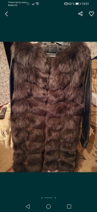 Продам меховую желетку