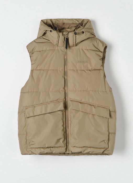 Капитониран елек