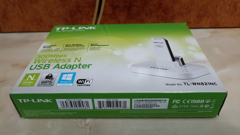 Vand un adaptor wirelles TP Link și un router Belkin