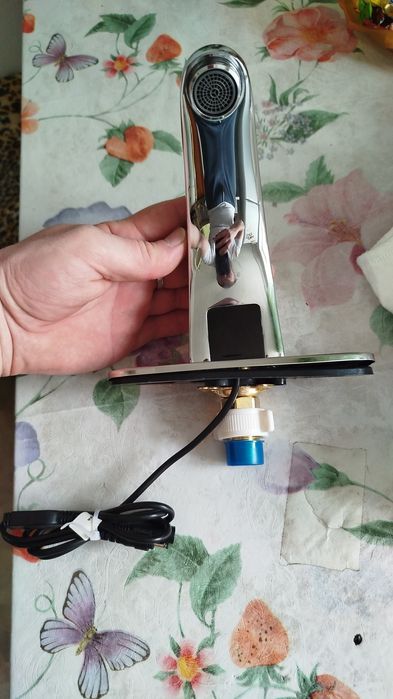 Сенсорный смеситель