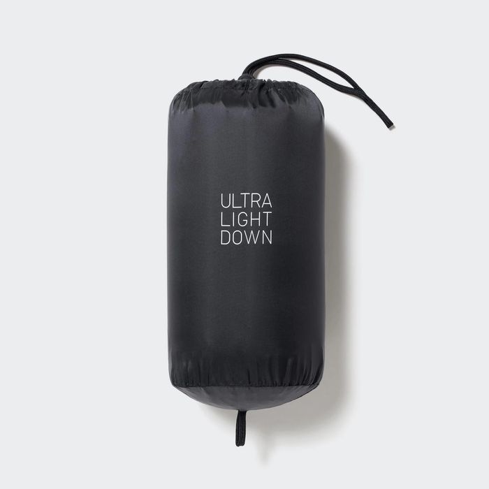 Vând vestă lungă UNIQLO verde impermeabilă pentru damă mărimea S