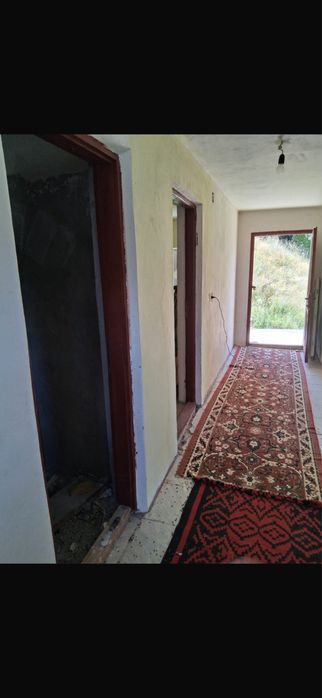 Casă cu teren 5.000 mp de vânzare în Rădăcinești, Vâlcea – zonă de munte