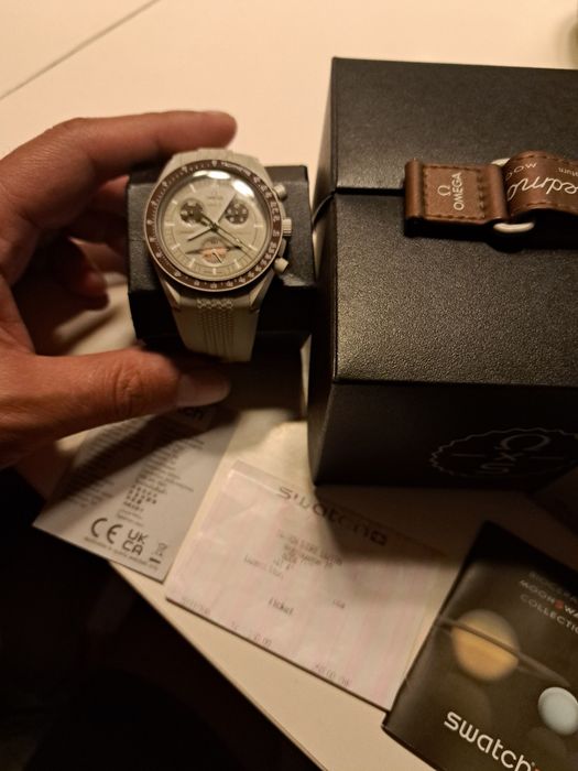 Omega swatch în stare bună