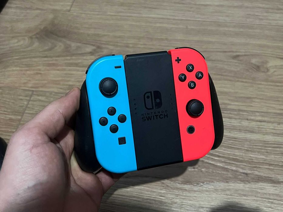 Joycon Nintendo switch+grip 100% original Nintendo,perfect functional