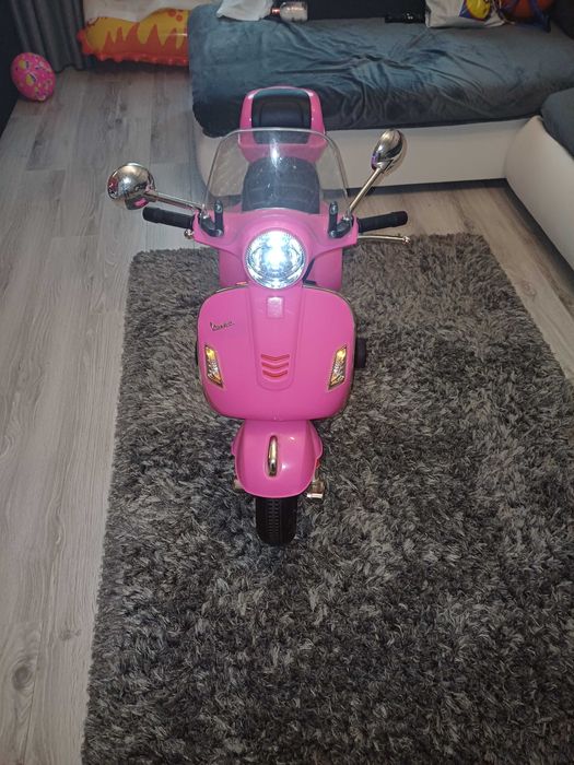 .Motoreta vespa .