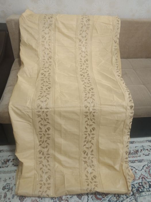 Шторы новые  2 штуки