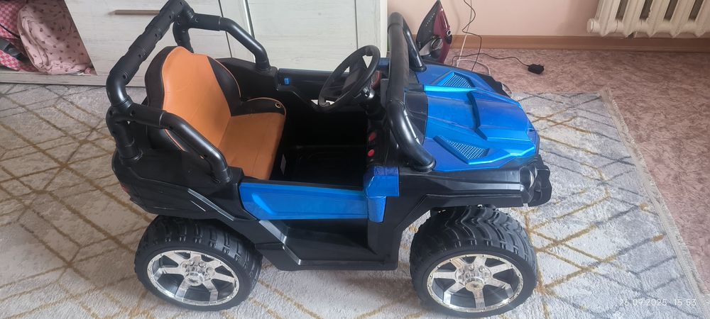 Детскую машину  для вождения