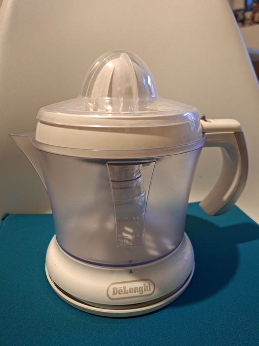Storcator citrice DeLonghi, capacitate 1 litru