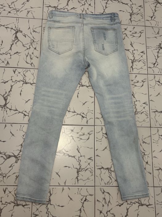 Blugi slim fit ripped