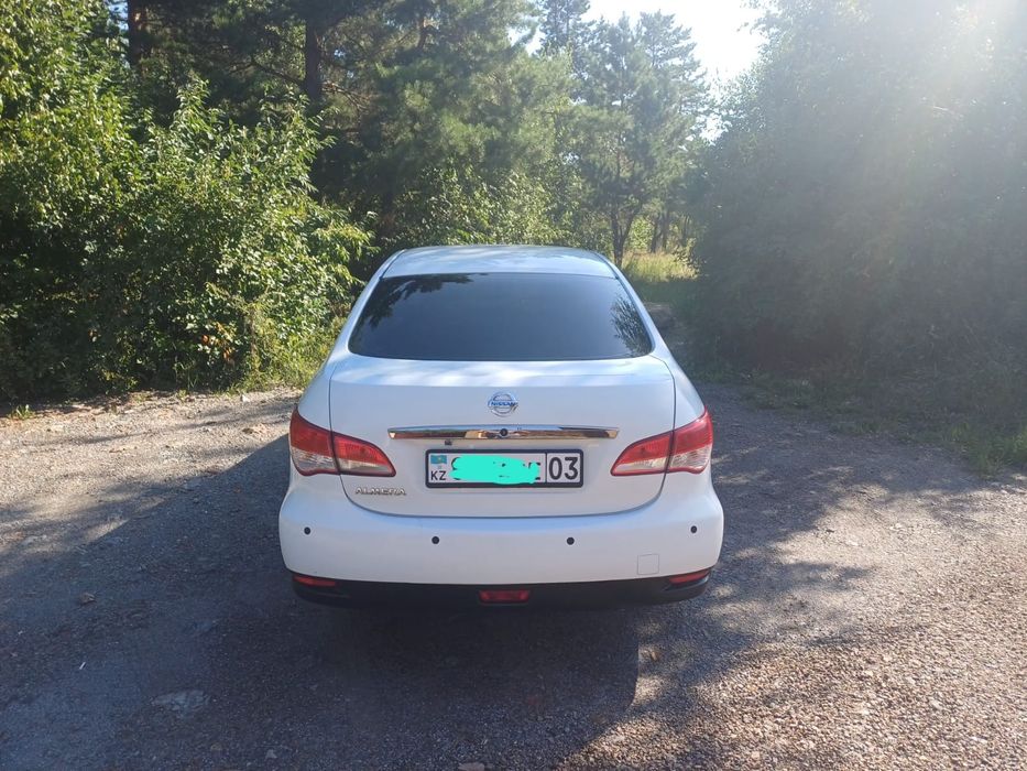 Nissan Almera 2014 1.6 л