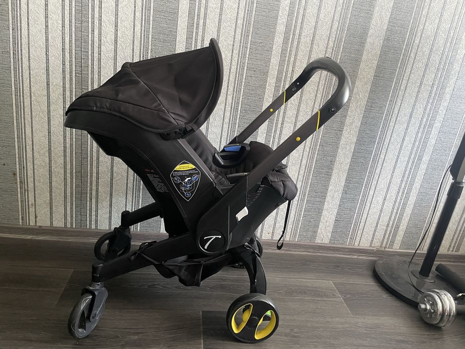 Продам Продаю коляску-автокресло Darex S800, черный цвет