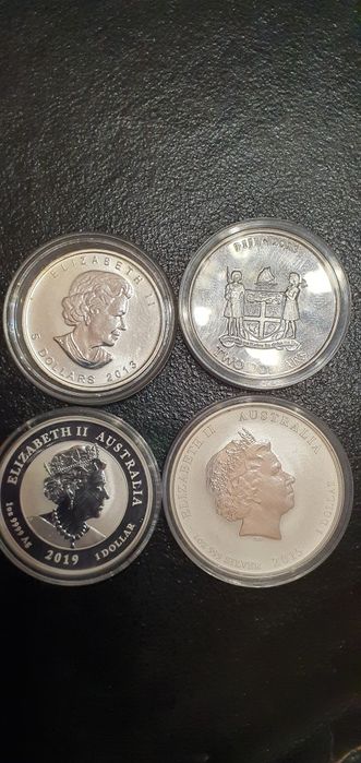 Lot 3  bucati (uncii )argint dolari U.S.A