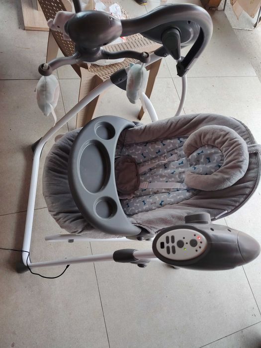 Balansoar electric de bebeluși