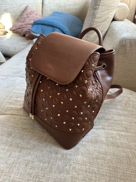 Раница с капси в отлично състояние